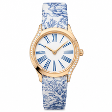 Relógio feminino de ocasião, 26 mm, com caixa em tom dourado e pulseira com padrão azul